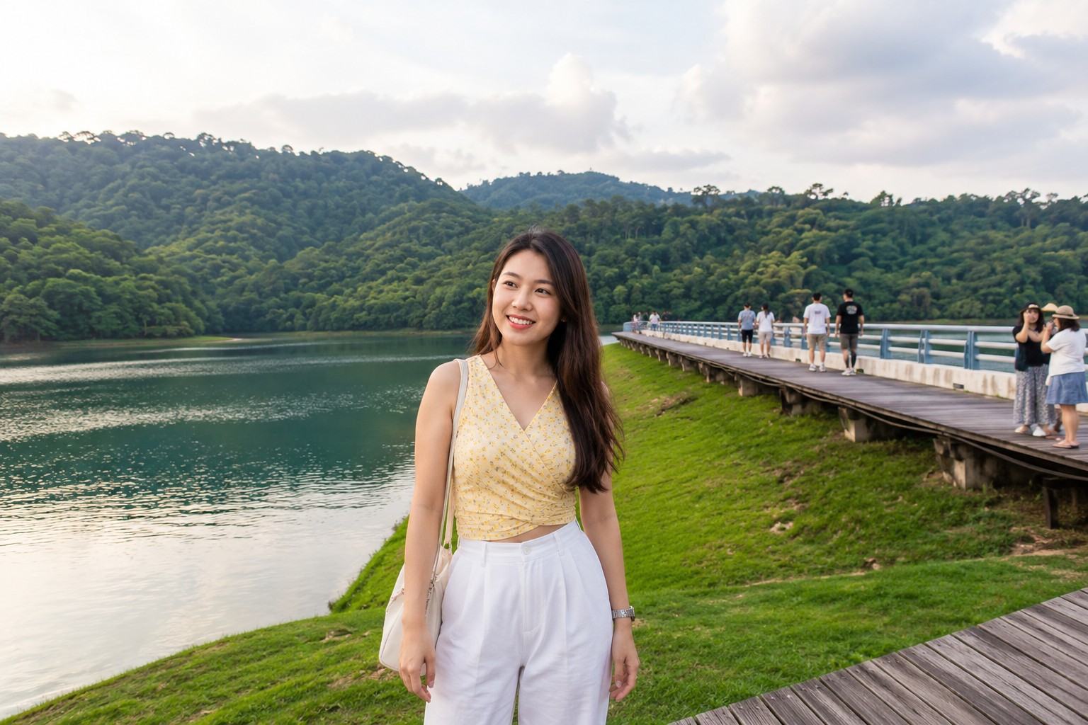 A woman posing in frnt of Sun Moon Lake