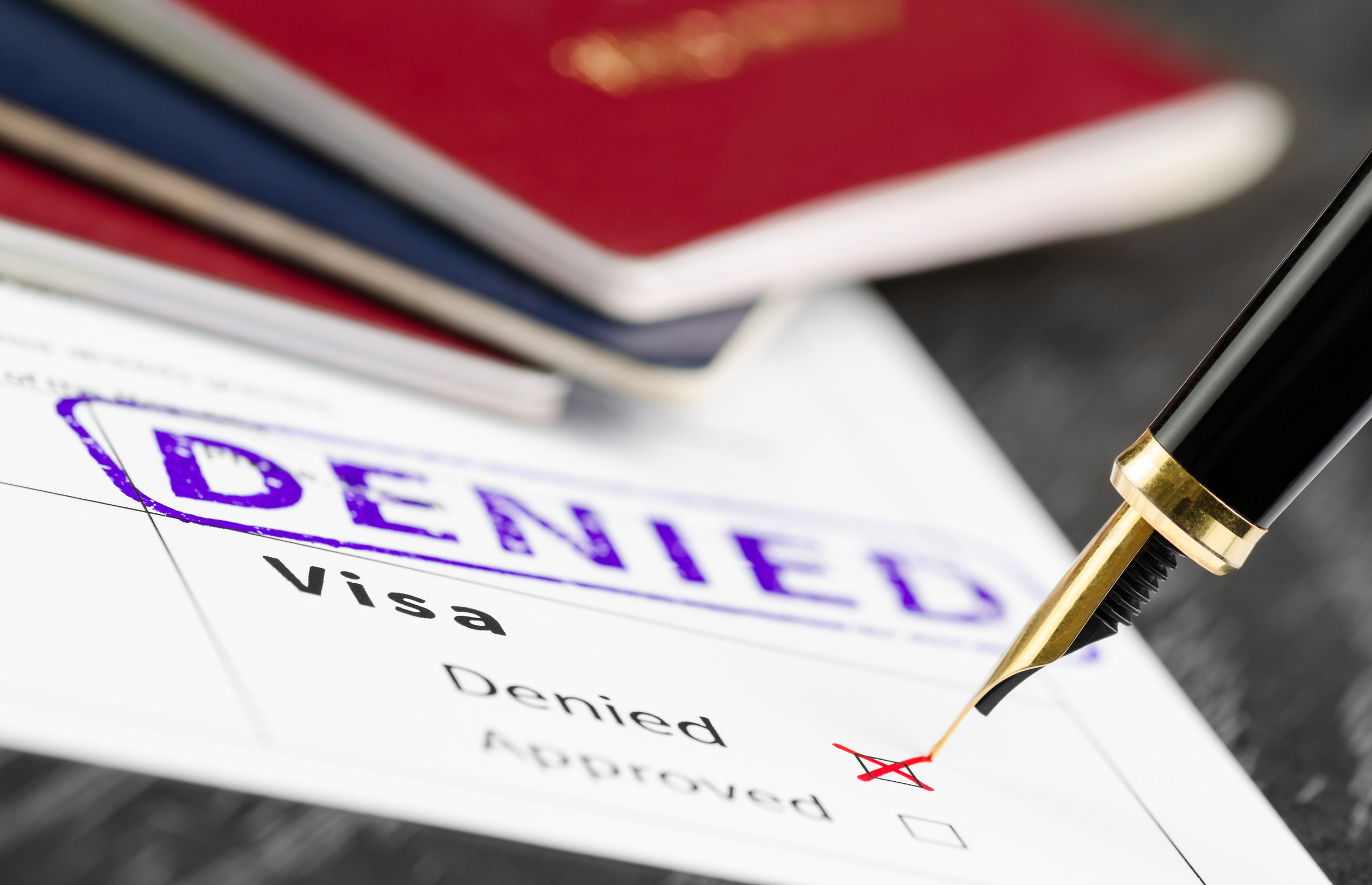 Visa Form Close Up Fountain Pen And Denied Stamped On A Document